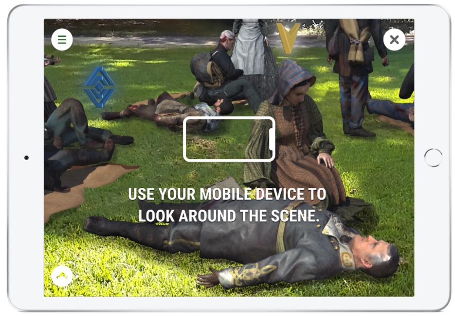 Showing a GBARE app placed scene with a nurse tending to a wounded solider and text on the screen saying use your mobile device to look around the scene